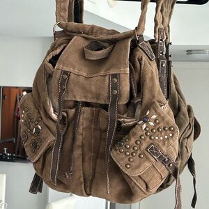 Free people denim washed backpack